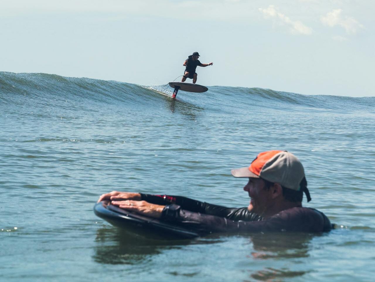 men surfing the sea waves