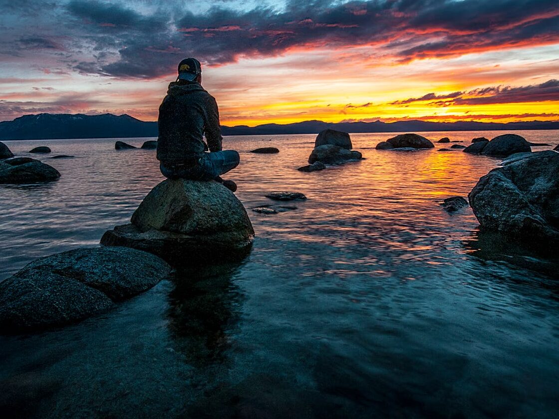person watching the sunset