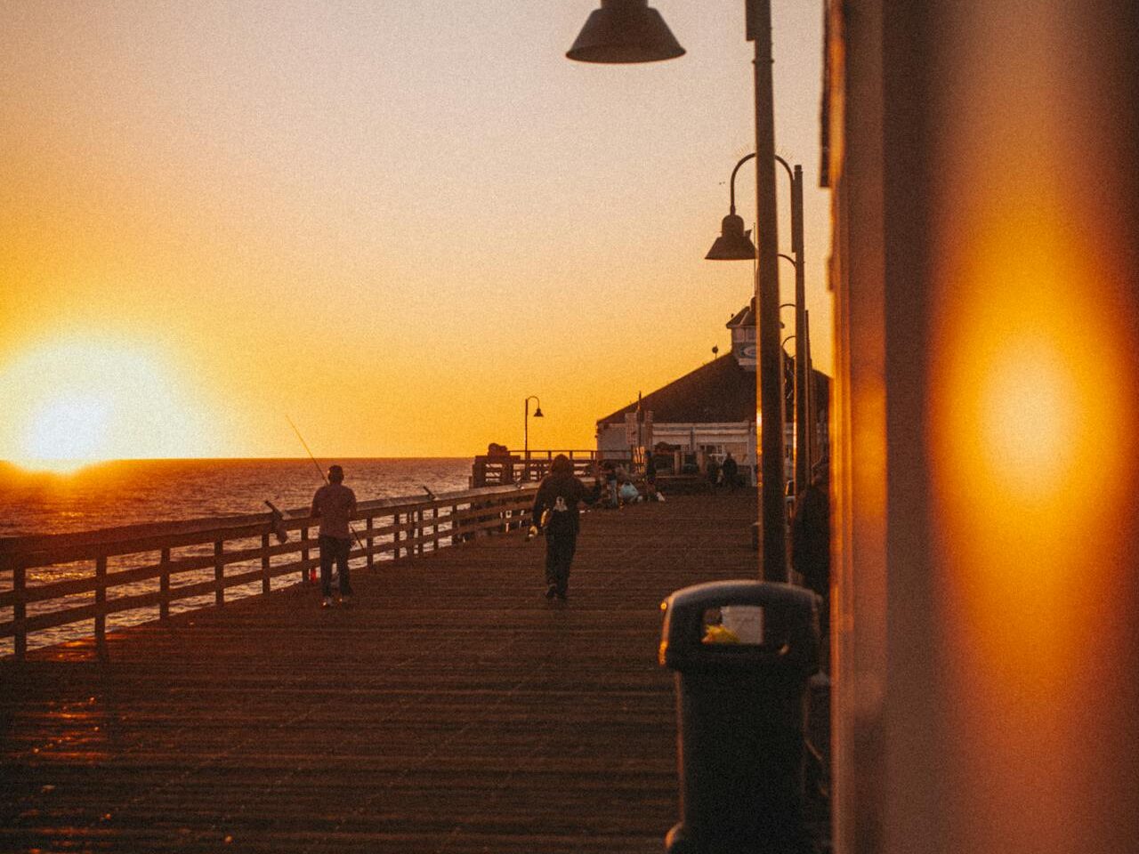 sunset silhouette on a scenic boardwalk