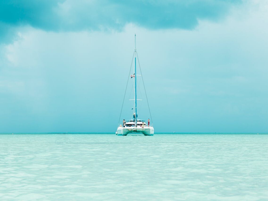 people on yacht on sea