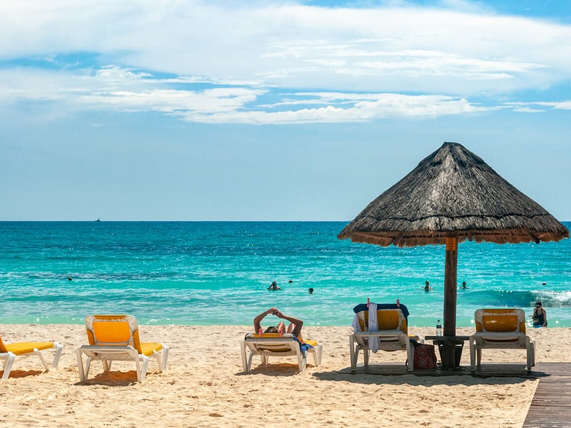 white and yellow lounge chairs